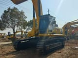 2023 Komatsu PC450 crawler excavator, front three-quarter view