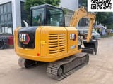2024 Caterpillar 306E2 mini excavator, rear three-quarter view