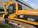 Гусеничный экскаватор Caterpillar 320CL 2018 года, вид сбоку
