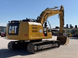 2017 Caterpillar 323FL crawler excavator, rear three-quarter view