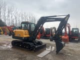 2024 Hyundai HX60N mini excavator, side profile view