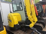 2024 Yanmar ViO55 mini excavator, rear three-quarter view