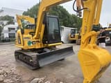 2024 Komatsu PC70-8 mini excavator, front three-quarter view