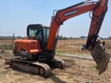 2023 Doosan DX55-9C mini excavator side view