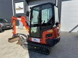 2024 Kubota KX019-4 mini excavator, rear three-quarter view