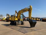 2019 Komatsu PW180-11 wheel excavator, front three-quarter view