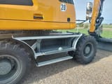2022 Liebherr A914 LITRONIC G6.0-D wheel excavator side view of storage compartment