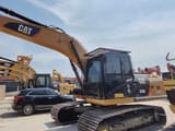 2023 Caterpillar 320D2 crawler excavator, side view