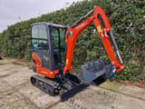2025 Kubota KX019-4 mini excavator, three-quarter front view