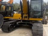 2024 Caterpillar 323 crawler excavator, rear-quarter view