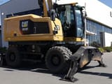 2016 Caterpillar M318F wheel excavator side view
