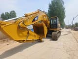 Caterpillar 330B crawler excavator, front three-quarter view