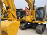 2023 Komatsu PC210 crawler excavator, front three-quarter view