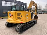 2023 Caterpillar 308 mini excavator, rear three-quarter view