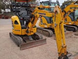 2022 Komatsu PC24MR-5 mini excavator, front three-quarter view