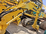 2006 Komatsu PC200 crawler excavator, front three-quarter view