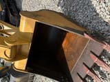 2021 Caterpillar 312D excavator bucket close-up