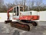 1985 Poclain 75CKB crawler excavator, rear three-quarter view