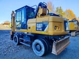 2014 Caterpillar M318D MH wheel excavator, rear three-quarter view