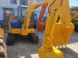 2018 Komatsu PC-55MR mini excavator, front three-quarter view