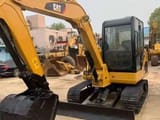 2023 Caterpillar 306D mini excavator, front three-quarter view