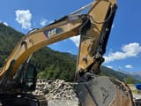 2012 Caterpillar 336EL crawler excavator boom and bucket view