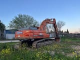 2009 Doosan DX420LC crawler excavator, rear three-quarter view