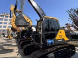2023 Volvo EC140 crawler excavator, side view
