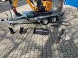 Berger Kraus BK1350JSR mini excavator on trailer with attachments