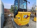 2022 Caterpillar 304 crawler excavator, rear three-quarter view