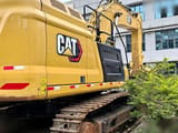 2021 Caterpillar 349 crawler excavator, rear three-quarter view