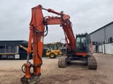2011 Hitachi ZX225 US LC crawler excavator, front three-quarter view