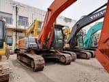 2023 Hitachi ZX210LC-5G excavator, side profile view