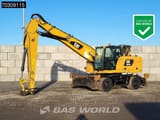 2018 Caterpillar MH3024 material handler, side view