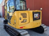 2019 Caterpillar 308 mini excavator, rear three-quarter view