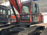 2024 Doosan 225LCA crawler excavator, front three-quarter view