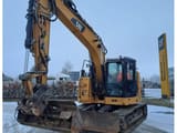 2018 Caterpillar 315F crawler excavator, front three-quarter view