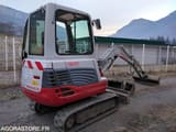 2012 Takeuchi TB 228 mini excavator, rear three-quarter view