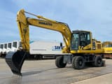 2019 Komatsu PW180-11 wheel excavator, side view