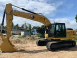 2025 Caterpillar 323D3 crawler excavator, side profile view