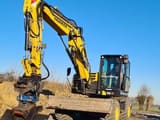 2020 Yanmar B110W wheel excavator, front three-quarter view
