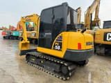 2022 Komatsu PC58 crawler excavator, rear three-quarter view