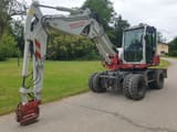 2013 Takeuchi TB295W wheel excavator, side profile view