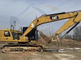 Caterpillar 320GC crawler excavator, side view