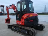 2022 Kubota U55-4 mini excavator, rear three-quarter view