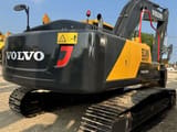 Volvo EC240 crawler excavator, rear three-quarter view