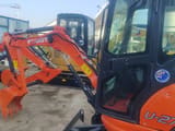 2022 Kubota U27 mini excavator, side view