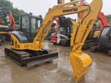 2015 Komatsu PC55MR-2 mini excavator, rear three-quarter view