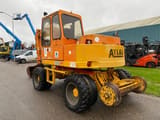 Atlas 1104 excavator, rear three-quarter view