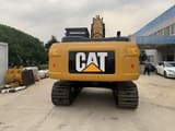 2023 Caterpillar 323 crawler excavator, rear view